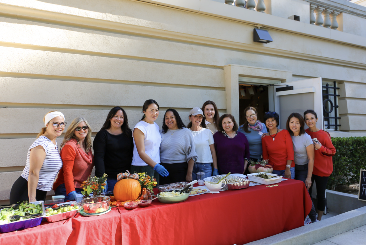 Senior room parents with the amazing dishes they made for the class of 2025.